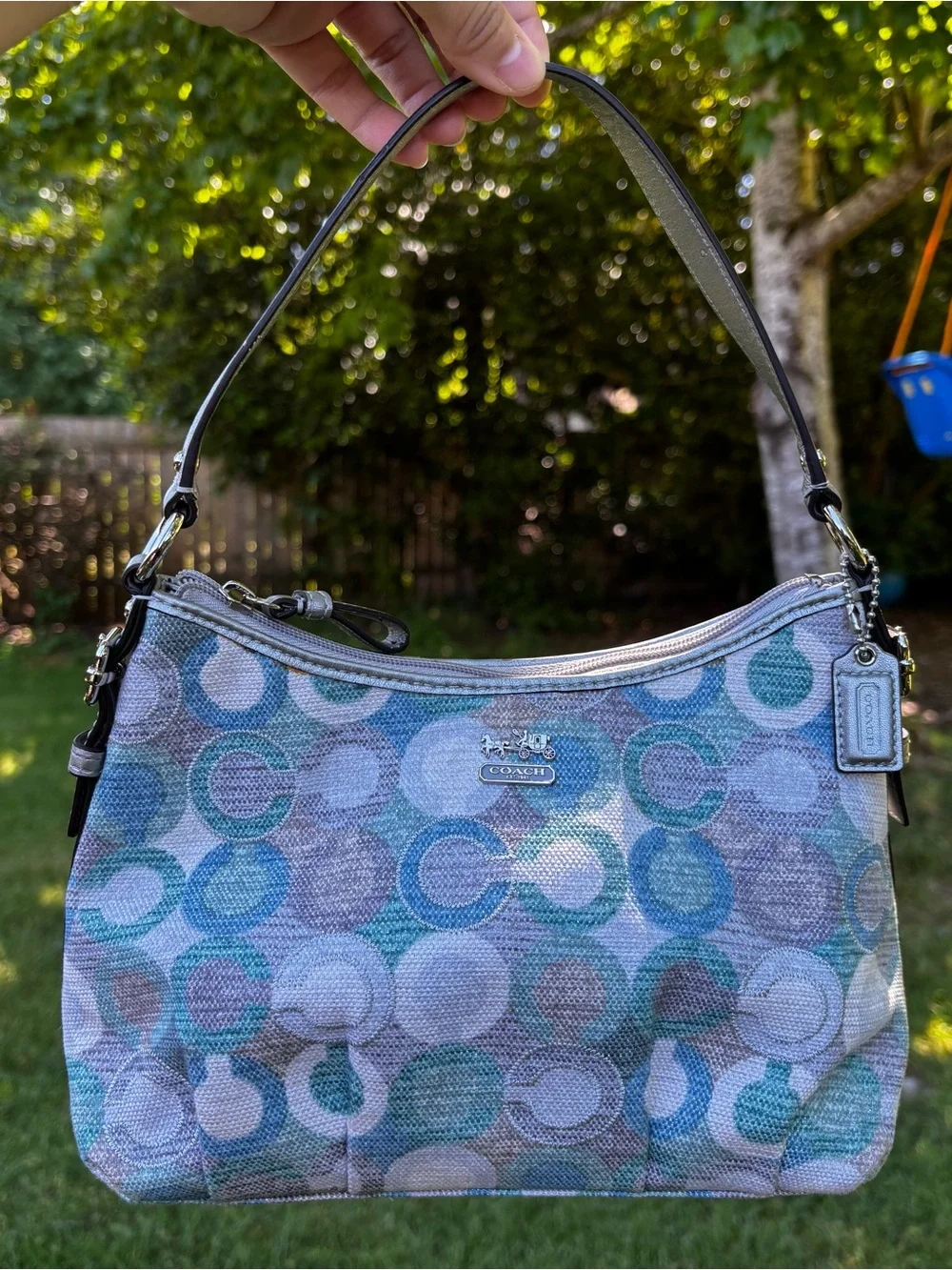 Coach baguette shoulder bag featuring a multicolored 